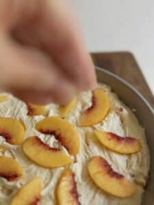 Sprinkle Extra Sugar on top of your un-baked peach cake for a little caramelization and crunch.