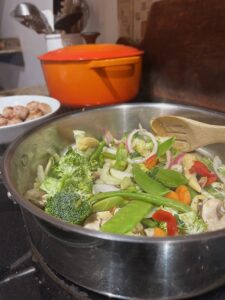 Saute' the stiry-fry vegetables in the same pan you cooked the meatballs in.