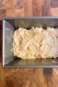 Layering apple fritter bread.
