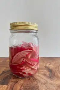 Pickled Red onions in a mason jar.