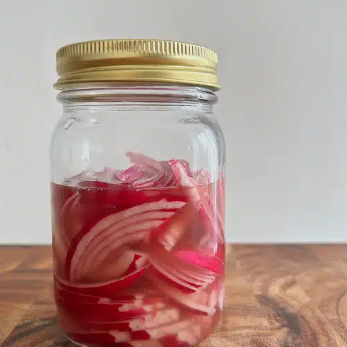 Pickled Red onions in a mason jar.