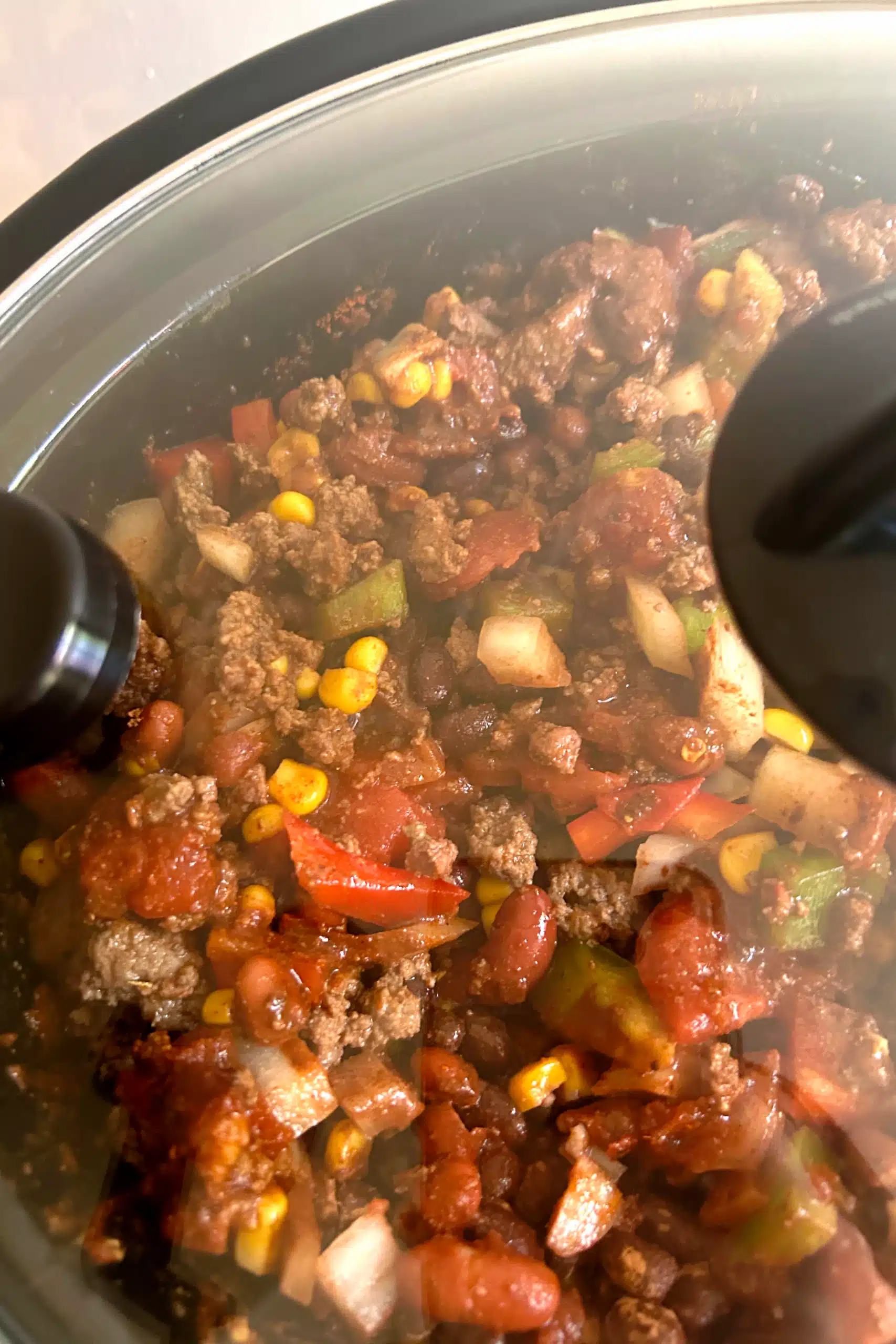 Chili cooking in a slow cooker.